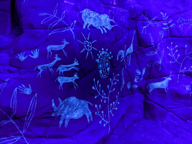 Glow in the dark cave paintings seen during Zufari at Chessington
