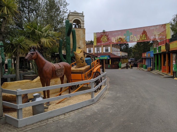 Mexicana area at Chessington showing horse and cart theming and banner