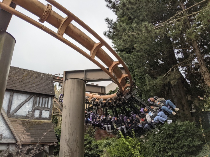 A train of riders on Vampire at Chessington